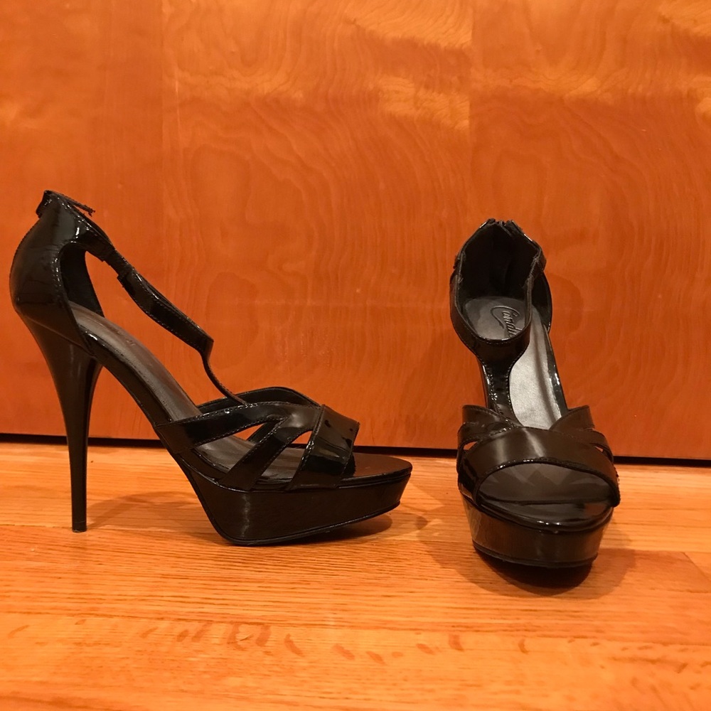 Candie’s stiletto black patent heels, never worn.